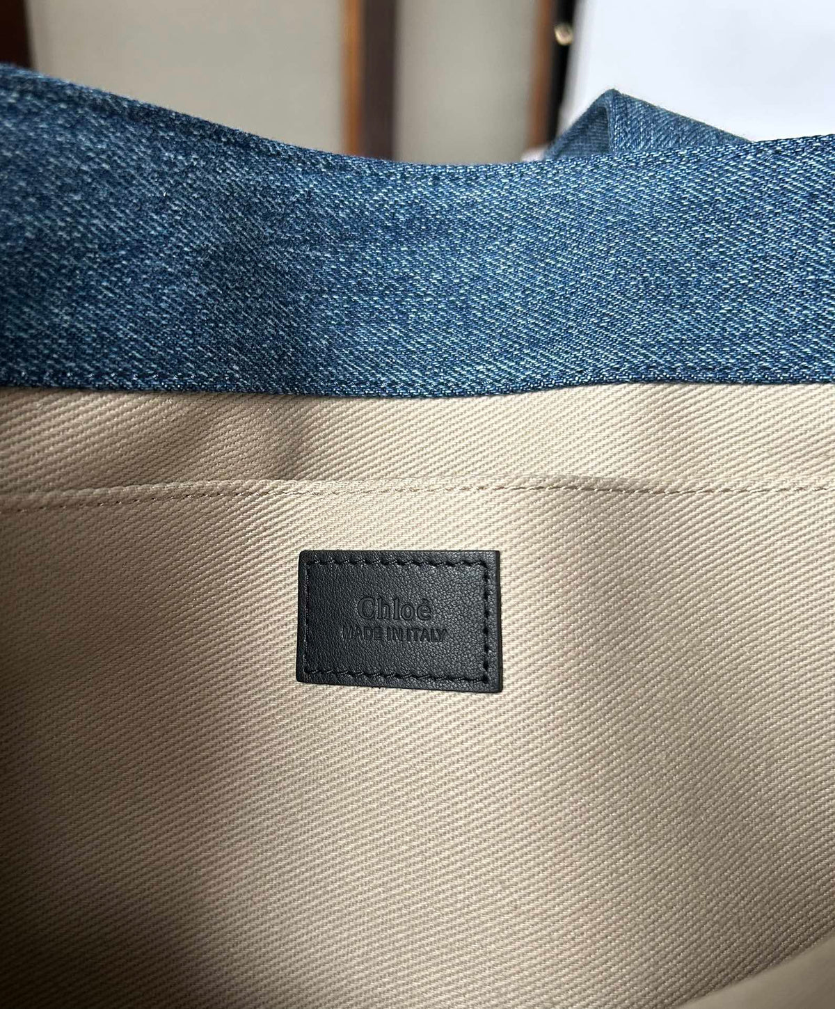 MEDIUM WOODY TOTE BAG 37 IN BLUE DENIM BLACK CALFSKIN