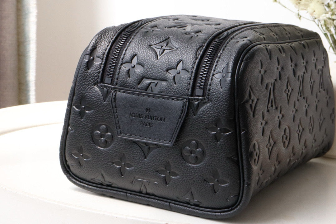 LOUIS VUITTON DOPP KIT TOILETRY BAG 28 CM IN BLACK TAURILLON MONOGRAM LEATHER