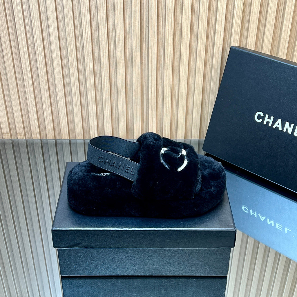 CHANEL 25S THICK-SOLED FURRY SLIPPERS WITH ELASTIC STRAPS IN BLACK FUR