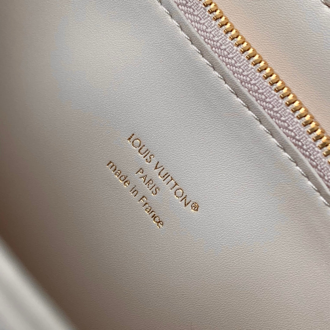 LOUIS VUITTON TWIST SLIM 19 IN LIGHT PINK TAURILLON CALFSKIN GOLD HARDWARE