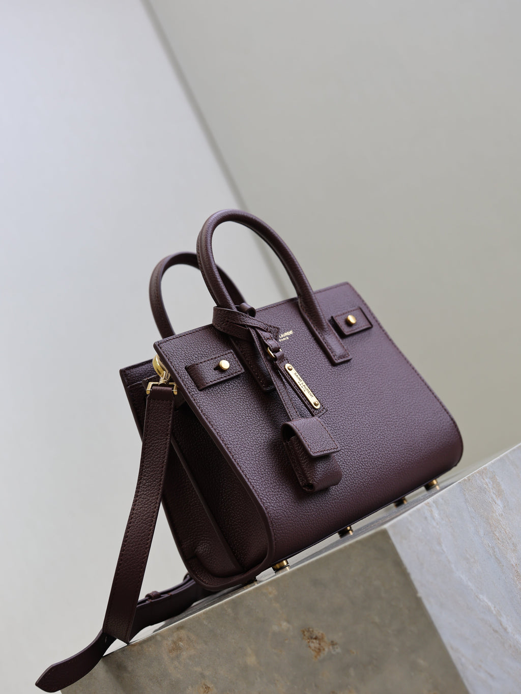 YSL 25S SAC DE JOUR 22 IN ROUGE CABERNET SUPPLE GRAINED CALFSKIN