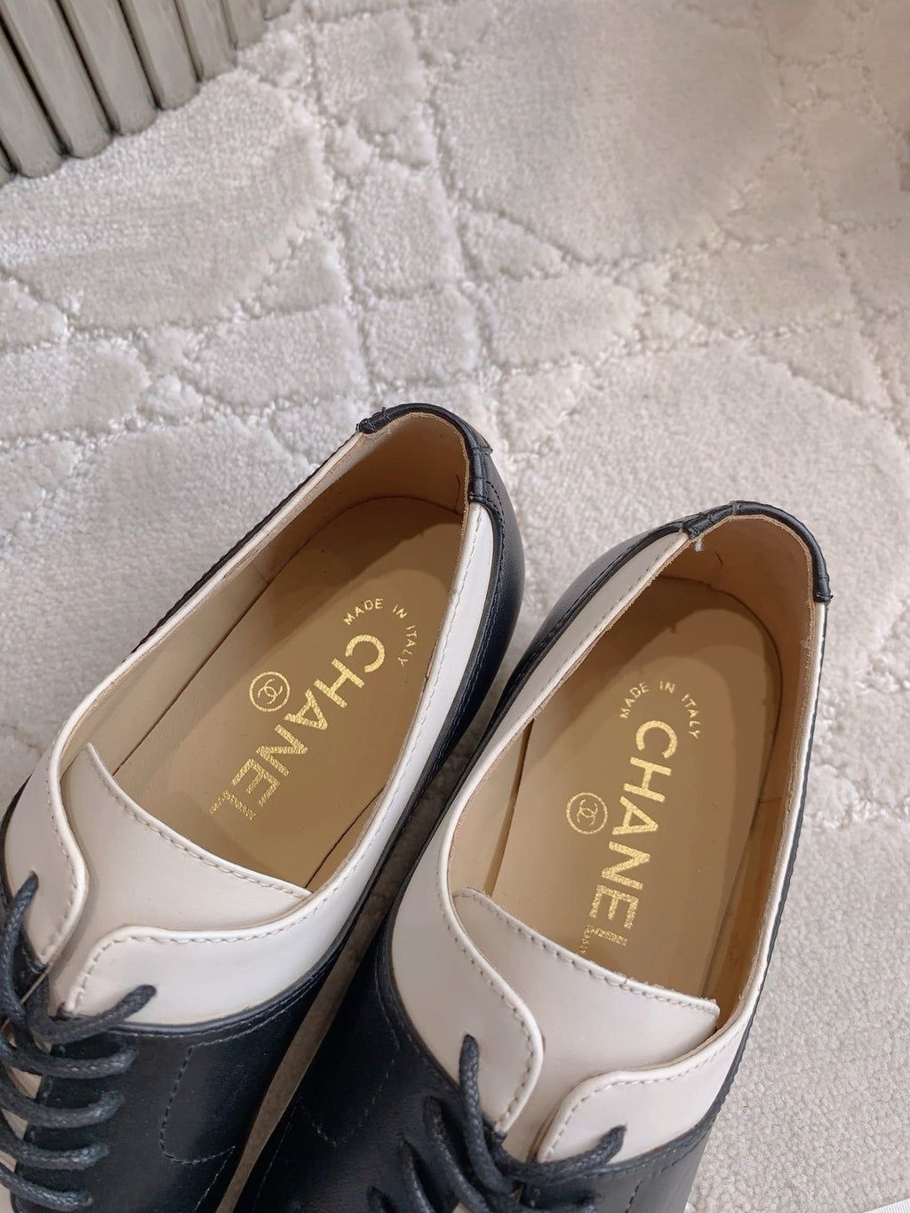 CHANEL 25S TWO TONE LACE UP IN BLACK AND WHITE CALFSKIN