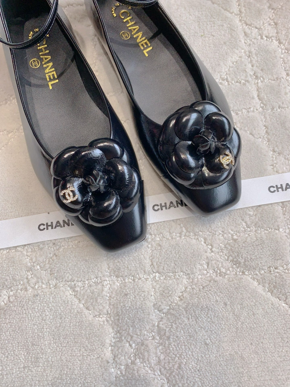 CHANEL 25S CAMELLIA SQUARE TOE FLATS IN BLACK CALFSKIN GOLD HARDWARE