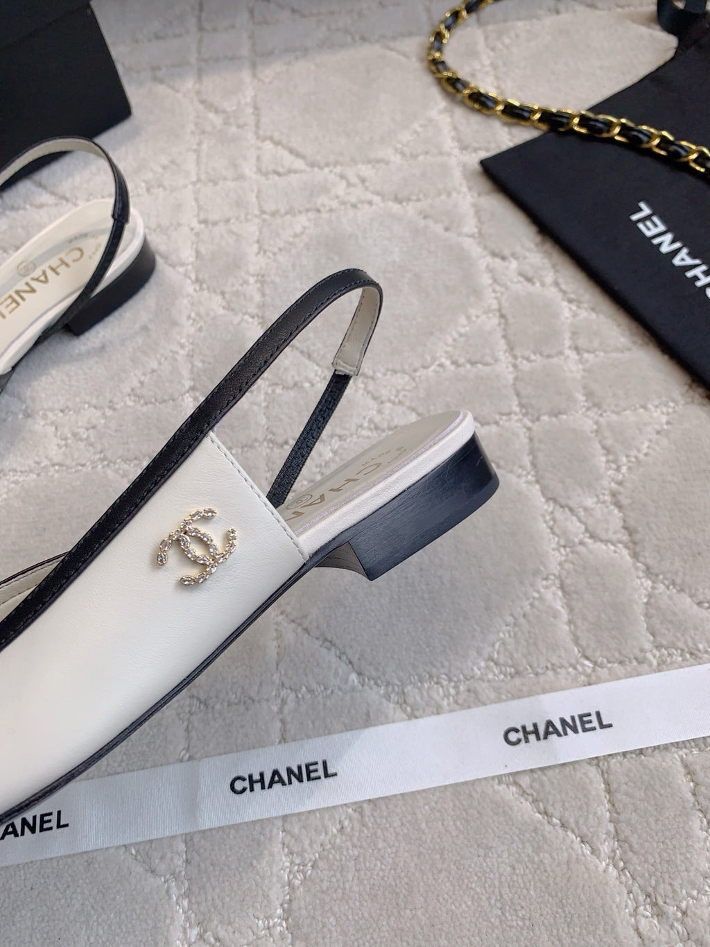 CHANEL 25S SLINGBACK IN BLACK AND WHITE CALFSKIN GOLD HARDWARE