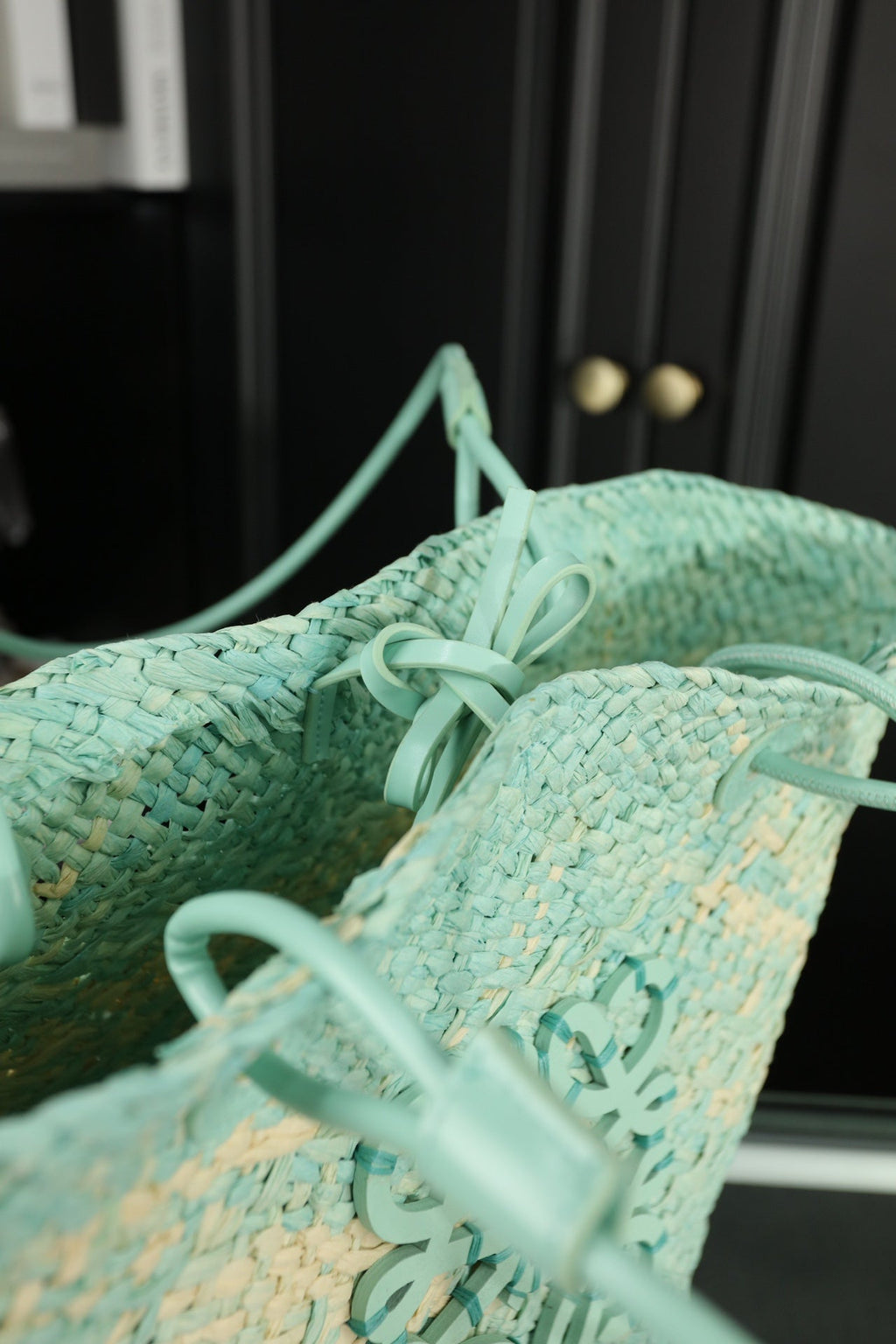 LOE SMALL ANAGRAM BASKET 28 BAG IN LIGHT BLUE IRACA PALM AND CALFSKIN