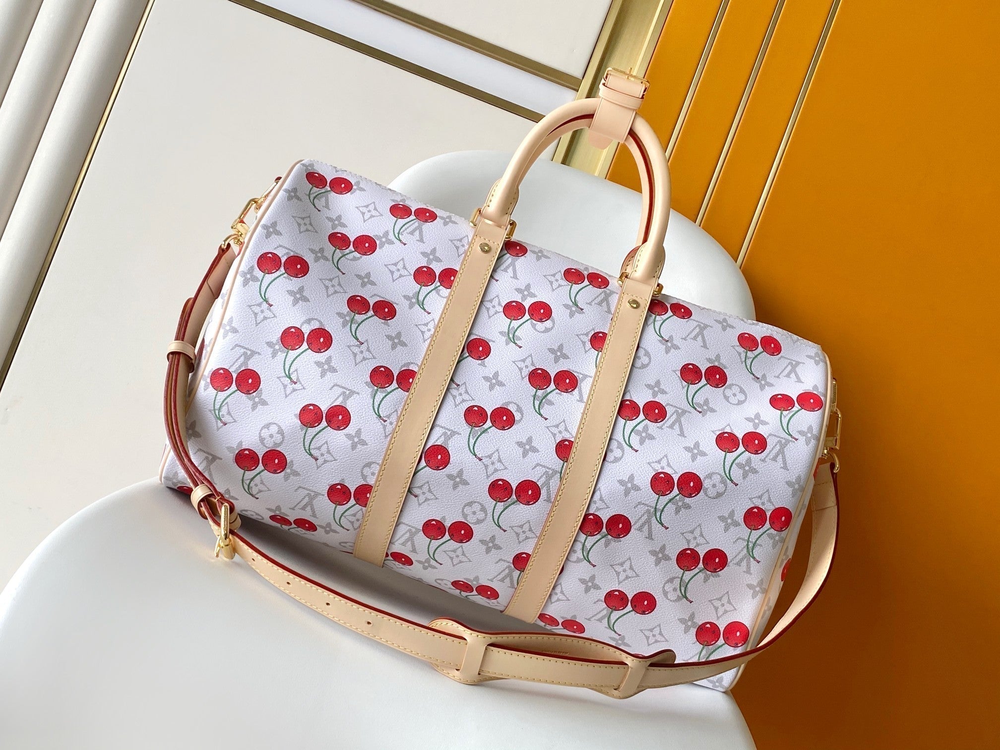 LOUIS VUITTON KEEPALL BANDOULIÈRE 45 IN WHITE AND RED CALFSKIN