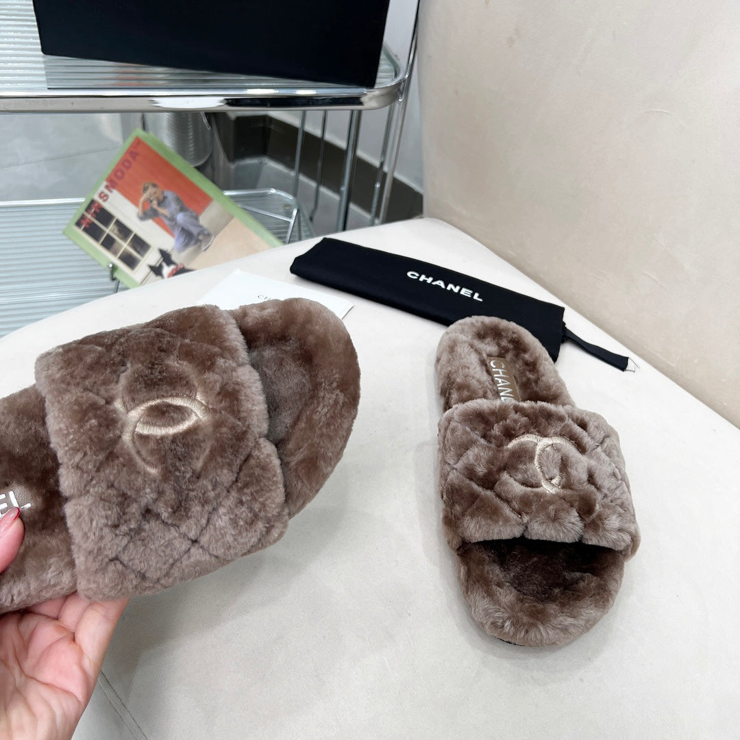 CHANEL 25S FUR SLIPPERS WITH EXPOSED-STITCH STRAPS IN DARK BROWN