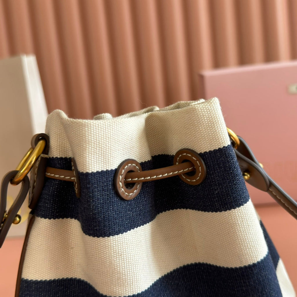 MIUMIU 26S BUCKET BAG 23 IN CREAM AND NAVY BLUE CANVAS GOLD HARDWARE