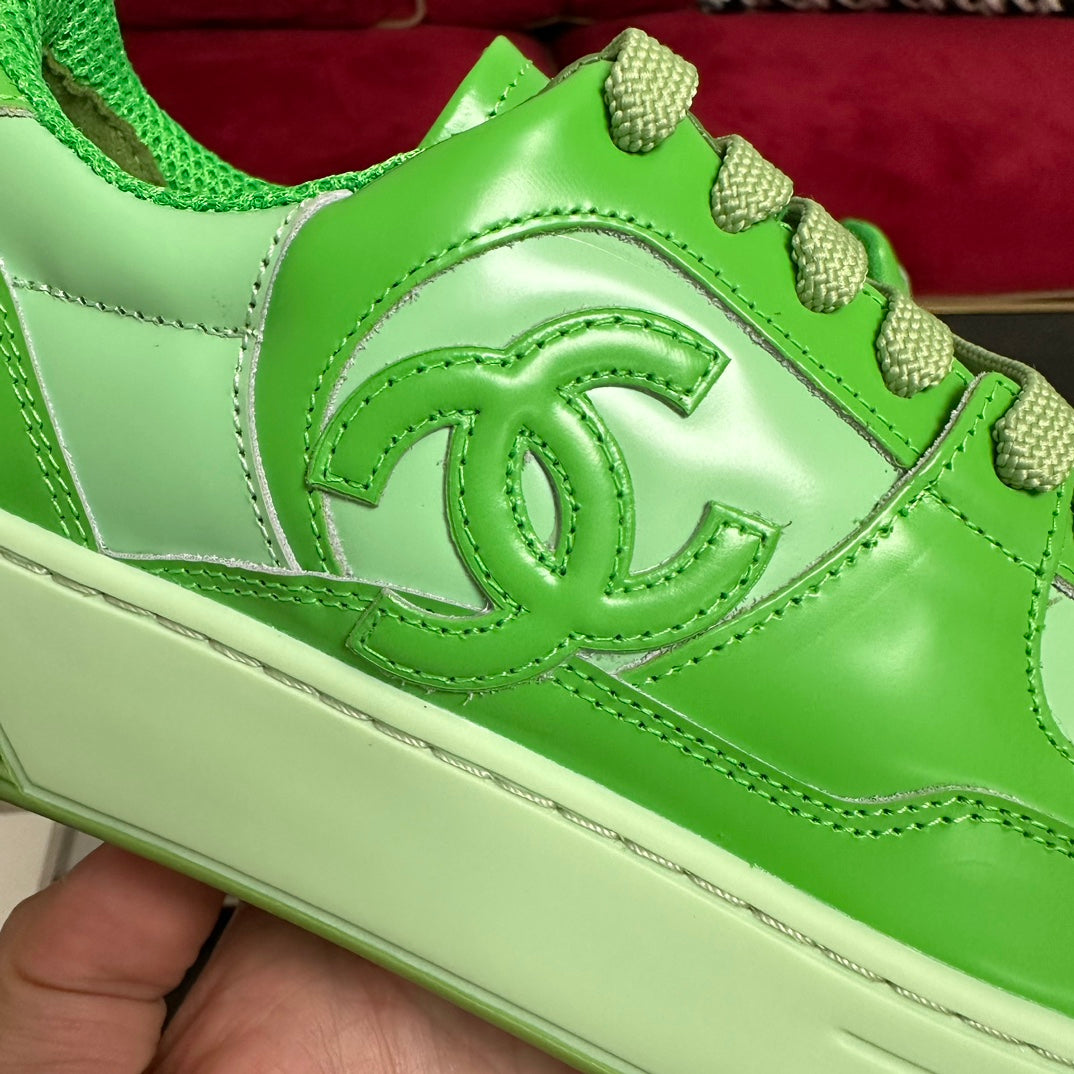 CHANEL TRAINERS IN LIGHT GREEN SHINY CALFSKIN