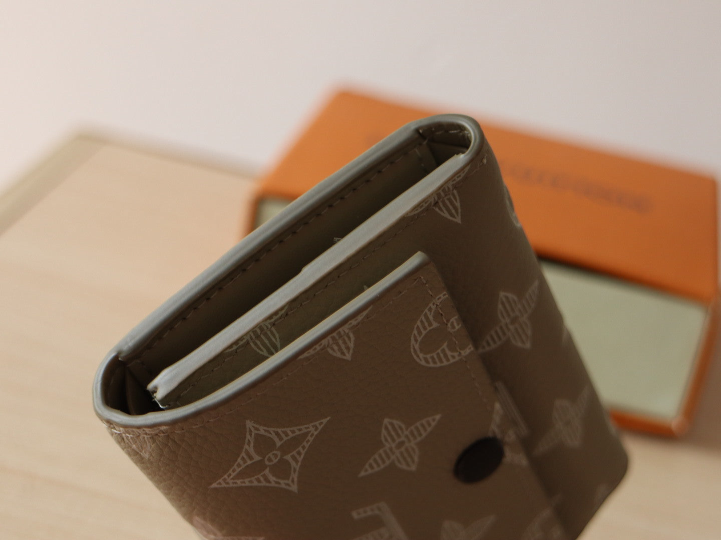 LOUIS VUITTON IRIS WALLET IN KHAKI BROWN EMBOSSED CALFSKIN