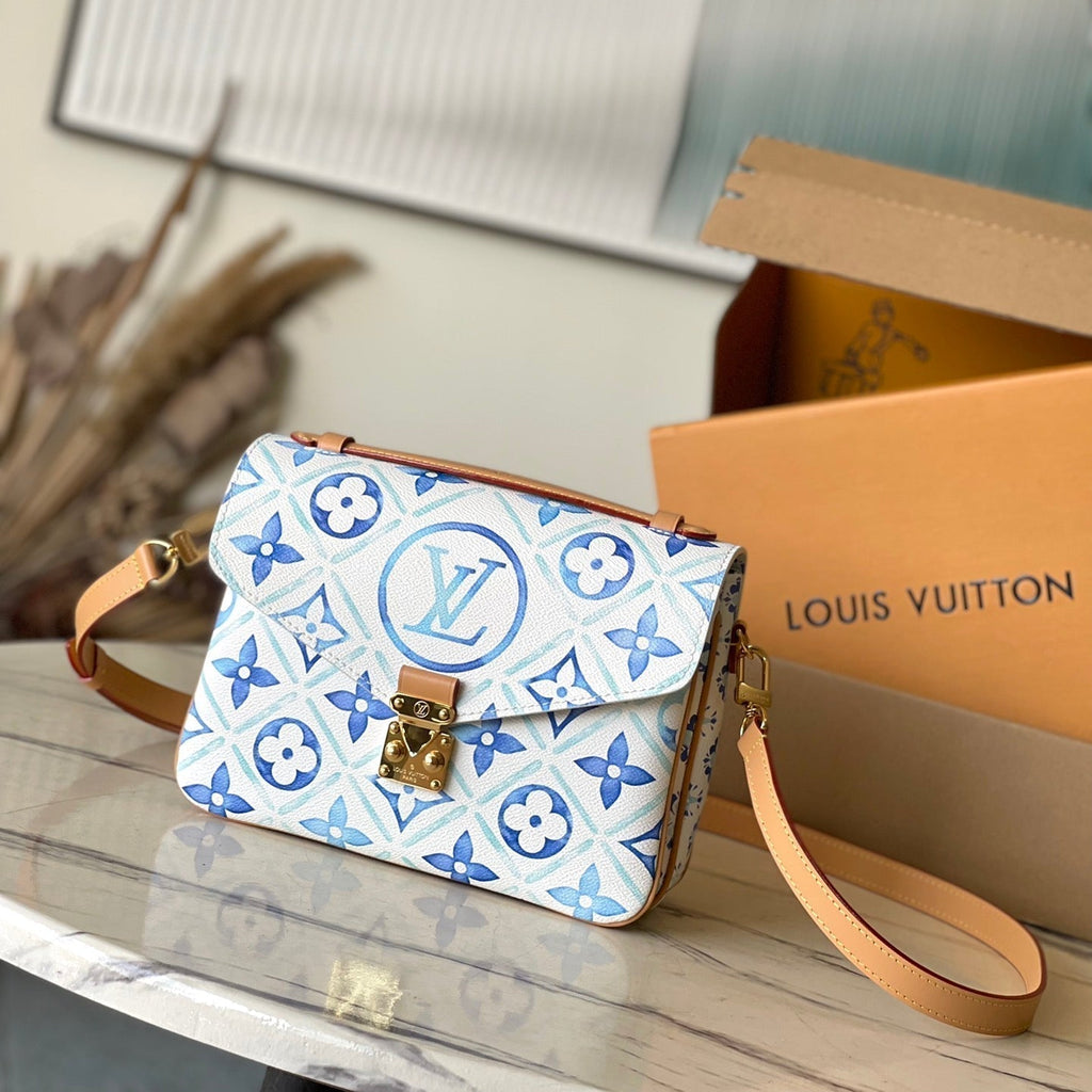 LOUIS VUITTON POCHETTE MÉTIS 25 IN LAGOON BLUE MONOGRAM TILES CANVAS GOLD HARDWARE