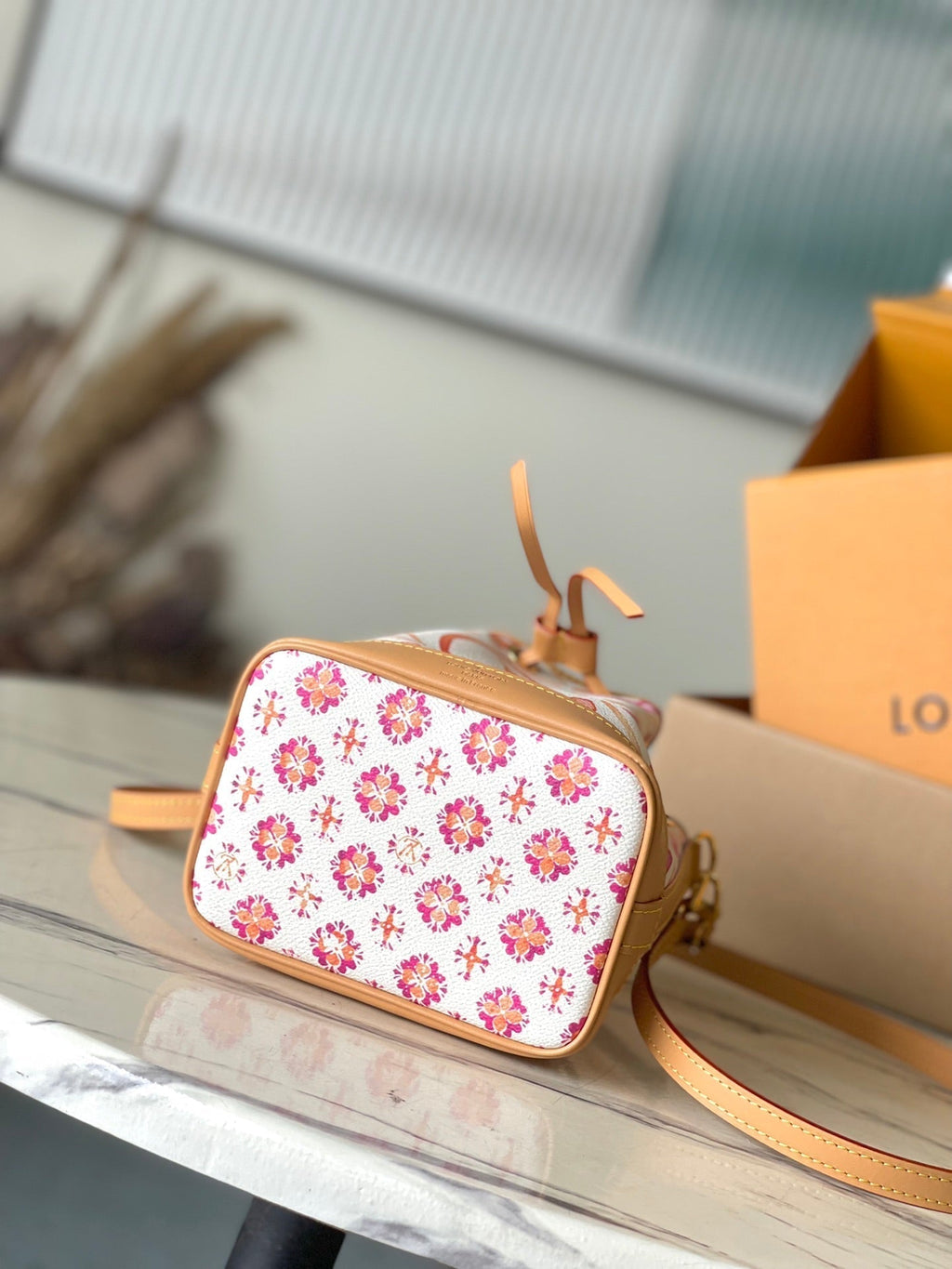 LOUIS VUITTON NANO NOÉ 16 IN CORAL MONOGRAM TILES CANVAS