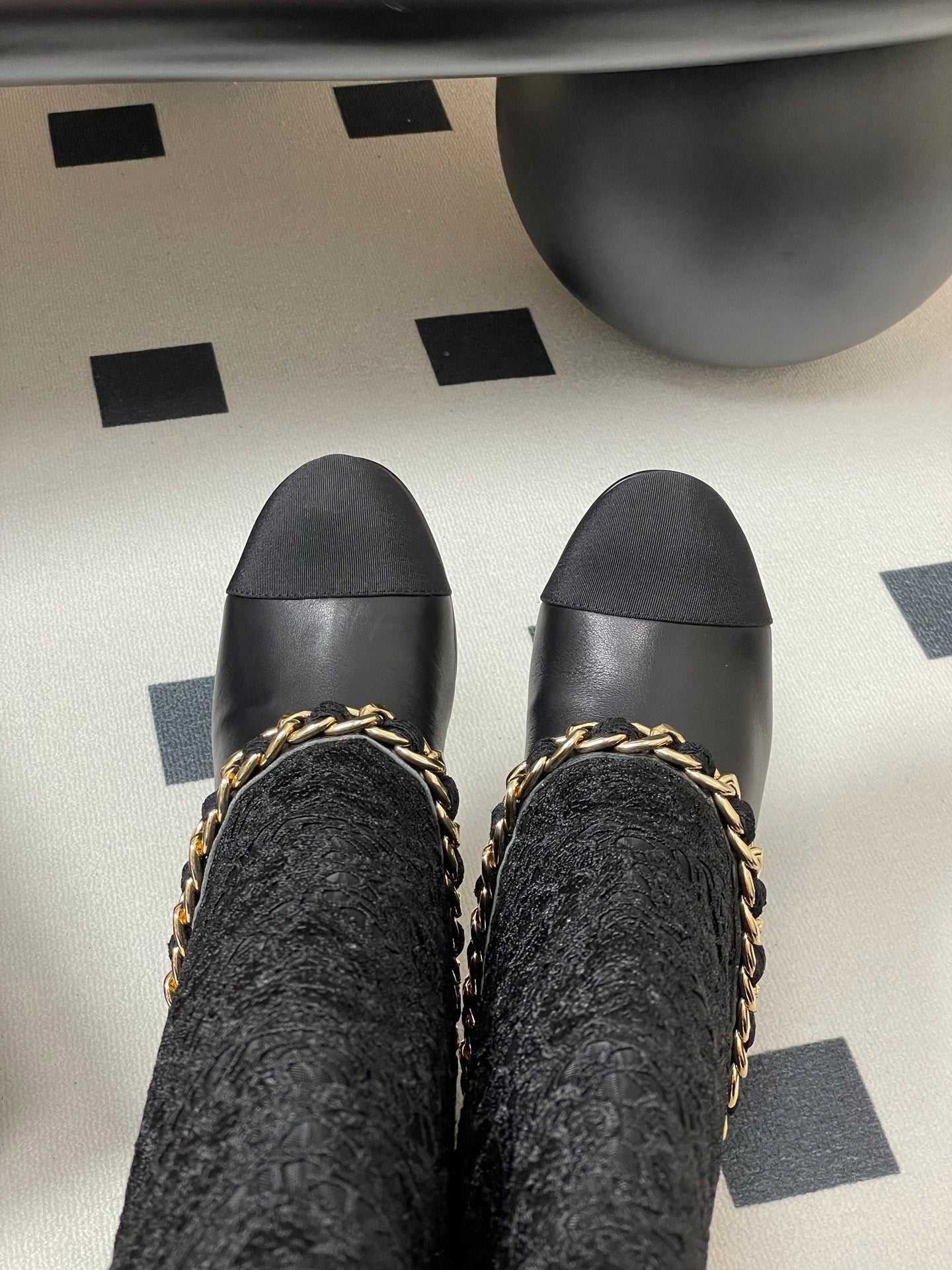 CHANEL FLORAL BOOTS 60MM IN BLACK CALFSKIN WITH GOLD CHAIN