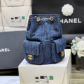 CHANEL DRAWSTRING BUCKET BACKPACK 24 IN DARK BLUE DENIM GOLD HARDWARE