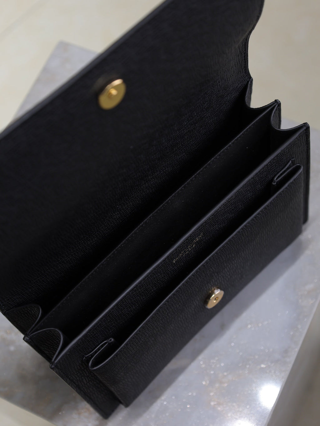 YSL 25S SUNSET MEDIUM 22 IN BLACK GRAINED CALFSKIN GOLD HARDWRE